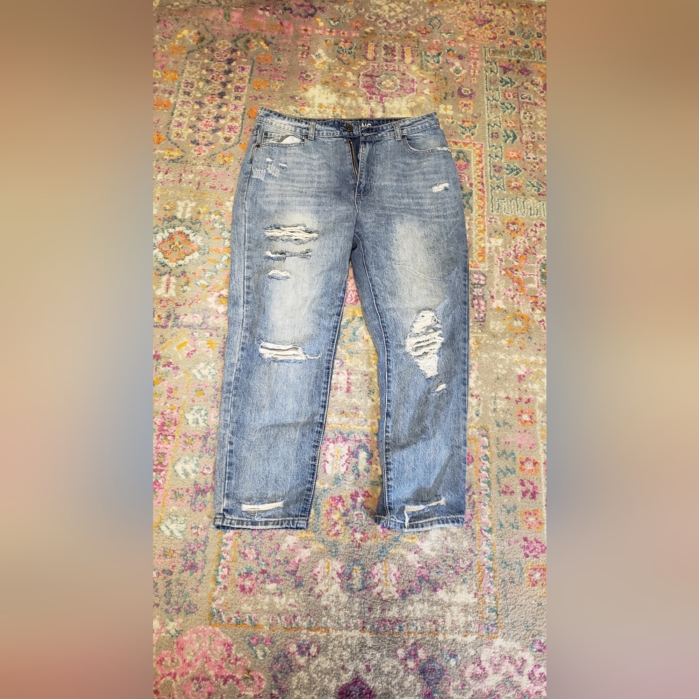 Distressed blue jeans